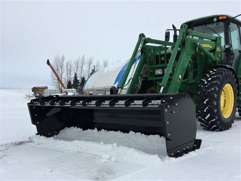 compact track loader pushing snow|Snow Pusher .